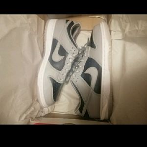 Nike dunk low college navy size 6.5w with receipt.